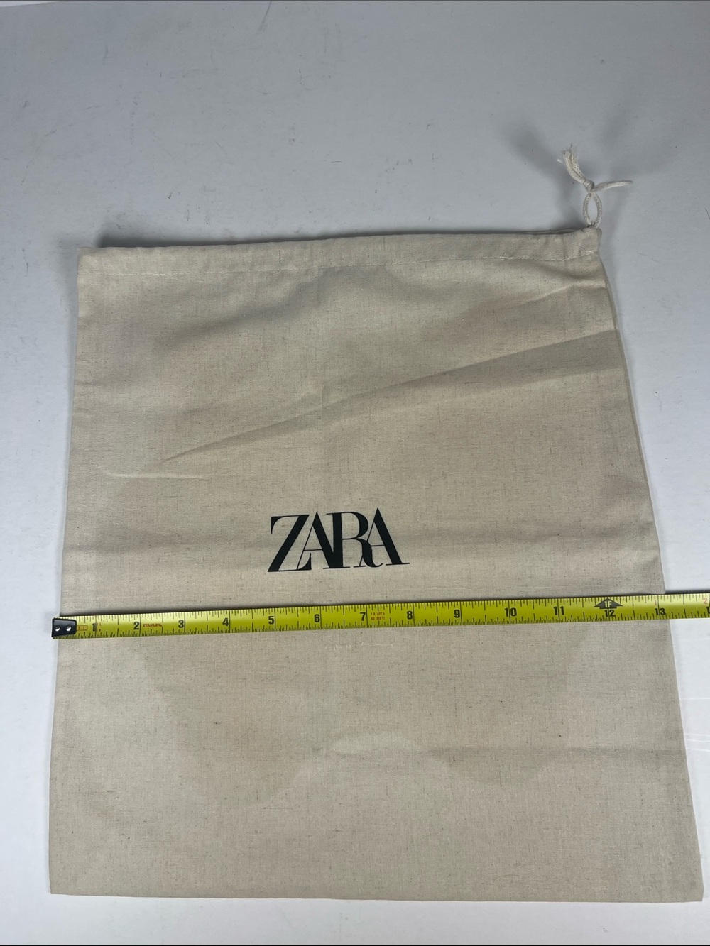 Zara Beige Canvas Drawstring Pouch - Black Logo